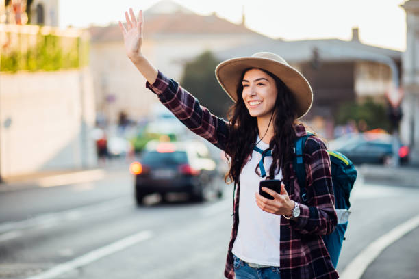 istock Female tourist catching a ride 1223366937