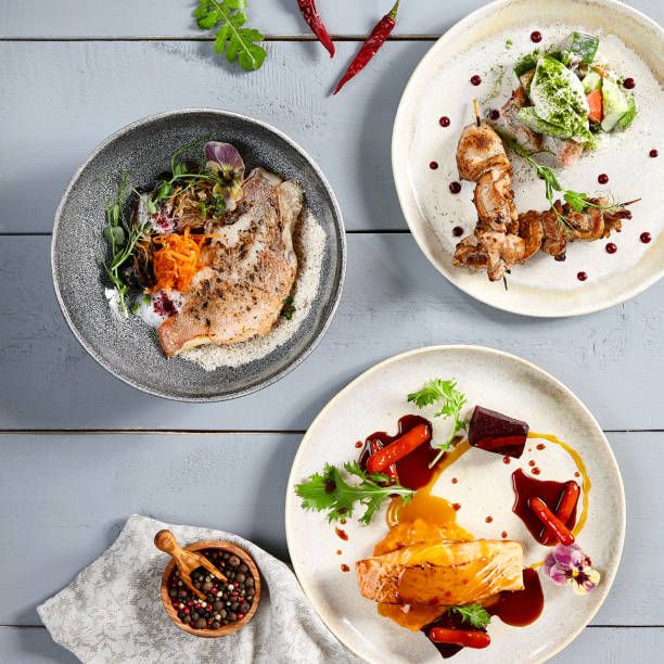 istock Hot meals in ceramic plates top view 1223369118