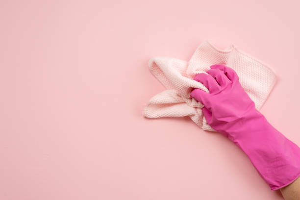 istock Hand in latex gloves and cloth on a horizontal surface 1223374167