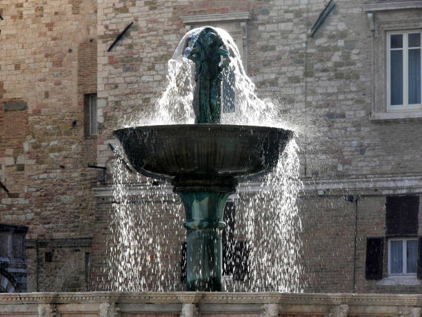The Fontana Maggiore is a monumental medieval fountain in the main square of Perugia, Umbria, Italy. stock photo