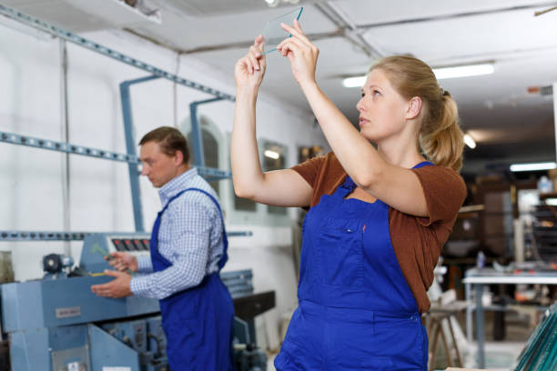 istock Woman working in glass workshop 1223377212