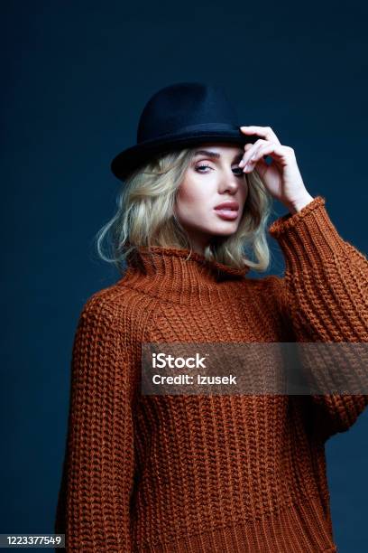 Autumn Portrait Of Elegant Woman In Brown Sweater Stock Photo - Download Image Now - Sale, 20-29 Years, Adult