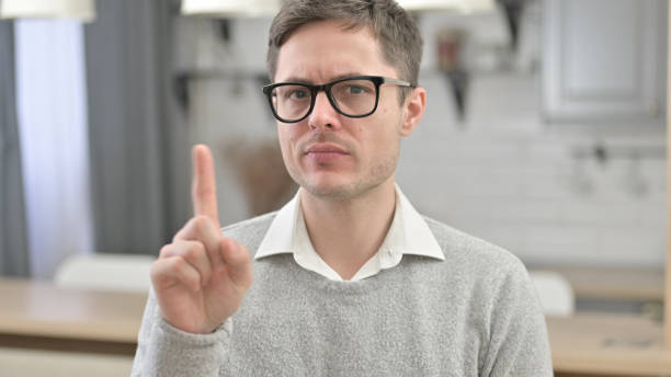 istock No, Young Man Rejecting by Finger 1223377663