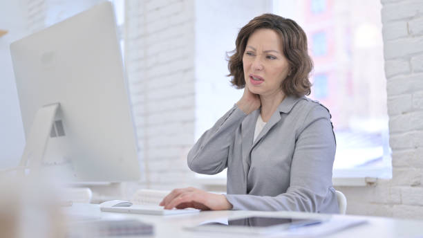 istock Tired Creative Old Woman having Neck Pain 1223377813