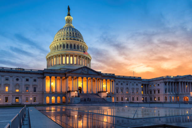 US Capitol building at sunset stock photo