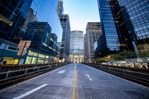 New York, New York - USA – May 2, 2020: The roadway on Park Avenue leading through Grand Central Terminal is empty of traffic due to health concerns to stop the spread of COVID-19 on Friday, May 1, 2020.