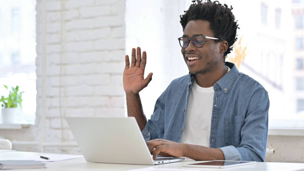 istock Young African Man doing Video Chat on Laptop 1223380463