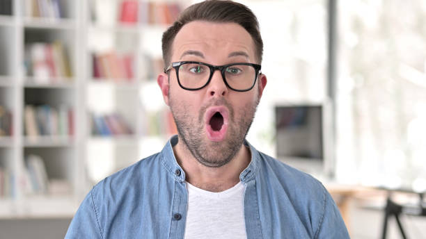 istock Upset Young Man in Glasses Shocked by Failure 1223380472