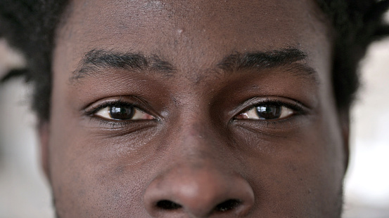 Close up of Blinking Eyes of African Man