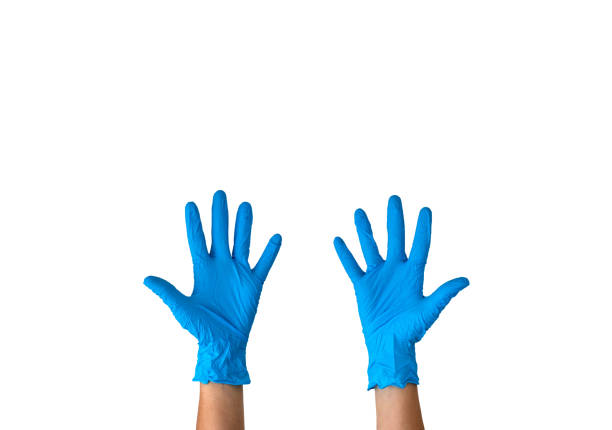 istock Human rising hands wearing blue disposable latex gloves on a white background 1223382271