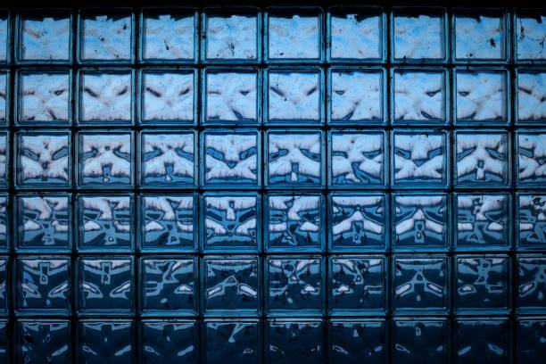 istock blue glass brick wall - seamless texture. color abstraction in brick glass wall 1223385161