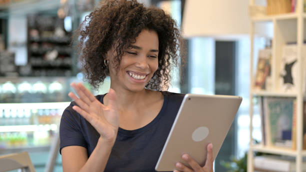 istock Video Chat on Tablet by Young African Woman 1223385864