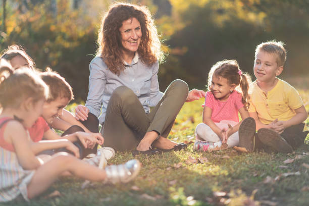 istock Group of happy children having fun in nature 1223387546
