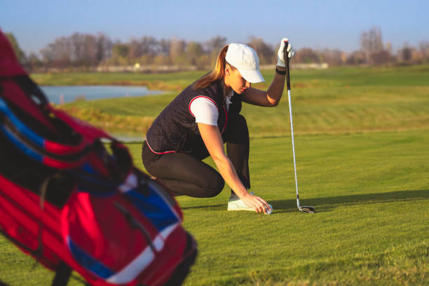 istock Young beautiful woman is training golf in autumn 1223390977
