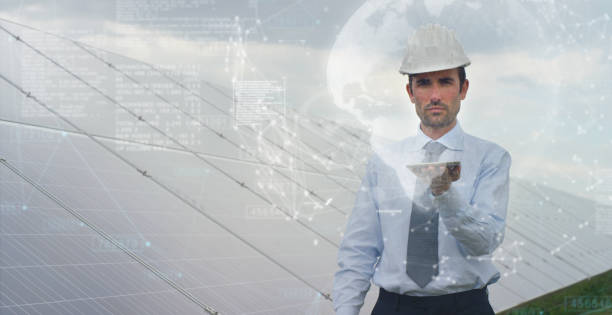 istock Portrait of a young engineer using futuristic technology while checking photovoltaic solar panels. 1223391291