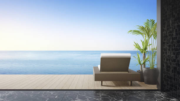 leżak na tarasie w pobliżu salonu w nowoczesnym domu na plaży lub luksusowej willi z basenem. - villa house marble tropical climate zdjęcia i obrazy z banku zdjęć