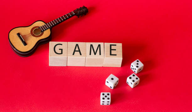 dice and guitar on a red background