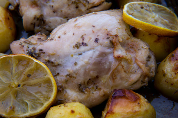 istock Greek Lemon Chicken and Potatoes 1223395192