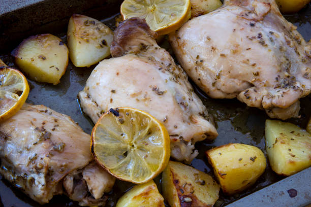 istock Greek Lemon Chicken and Potatoes 1223395219