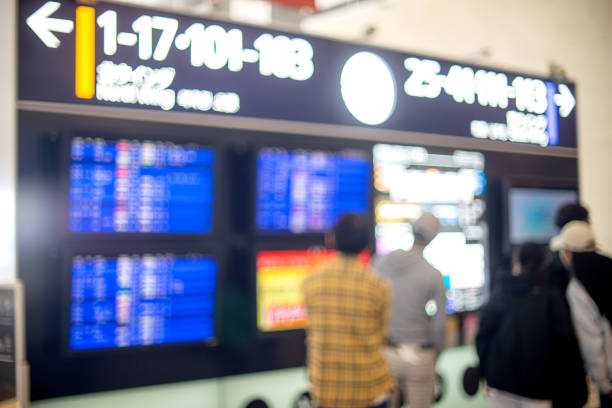 istock blur image of  airpot on screen board schedule for flight departure or arrival 1223395238
