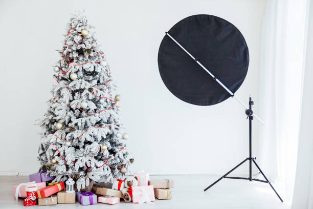 istock White Christmas Tree New Year presents holiday 1223400812