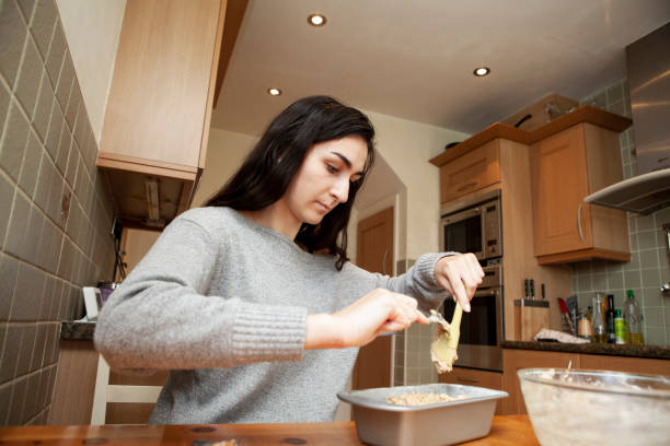 istock Teenager baking at home 1223403046