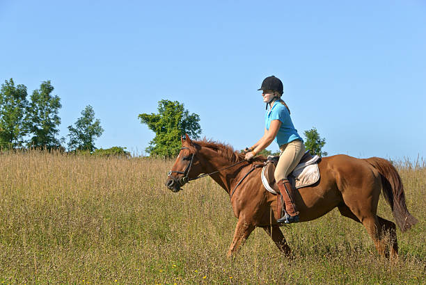 istock Girl Riding Horse 122340538