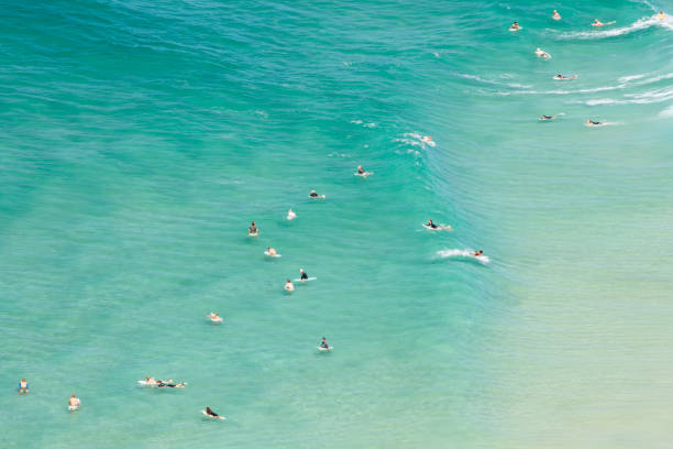 Australian Coastline with Surfers in Byron Bay