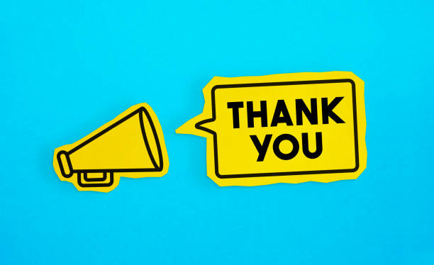 istock Megaphone drawing on the cut yellow paper makes “Thank” announcement. 1223408565