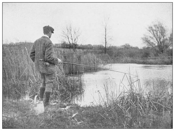 Antique black and white photograph of sport, athletes and leisure activities in the 19th century: Fishing Antique black and white photograph of sport, athletes and leisure activities in the 19th century: Fishing fishing rod photos stock illustrations