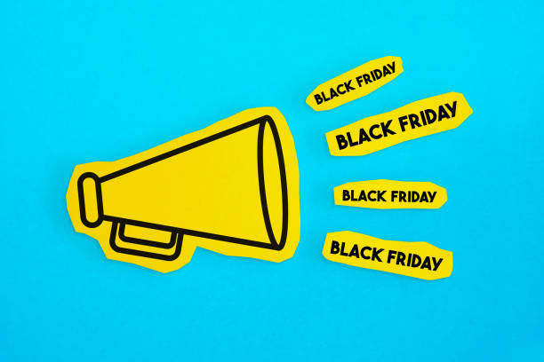 istock Megaphone drawing on the cut yellow paper makes “Black Friday” announcement. 1223409252