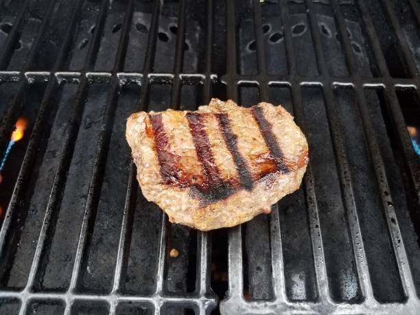 istock steak with grill marks on barbecue grill 1223413200