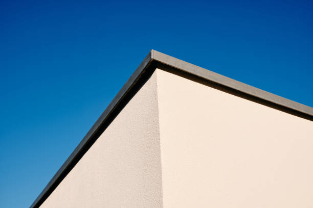 istock Abstract architecture shot of modern white house against blue sky 1223422859
