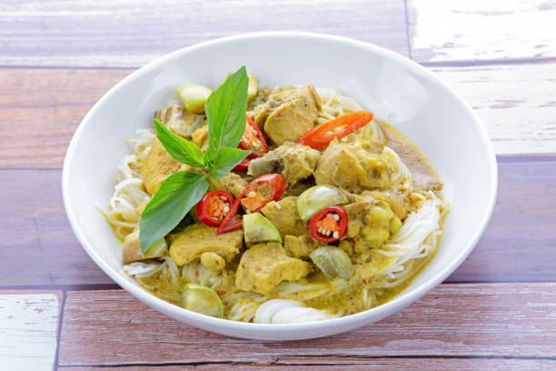 istock Green curry chicken with rice noodles 1223423184