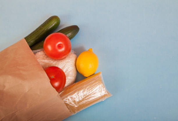 istock Products rice, pasta, tomatoes, cucumbers, lemon in a paper bag. Zero waste. Ecology 1223427928