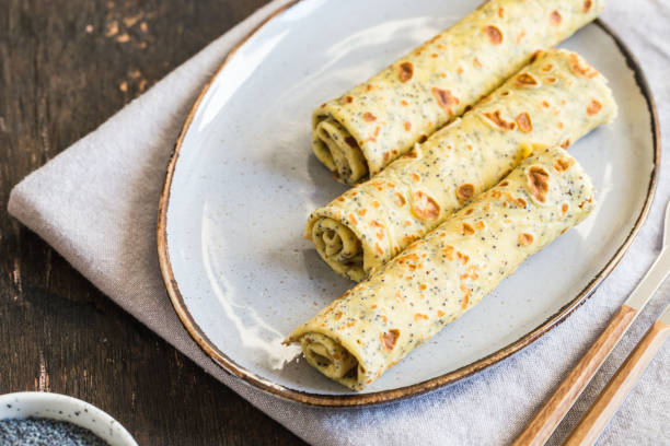 istock poppy seed crepes (blinis). pancakes with poppy seeds 1223428043
