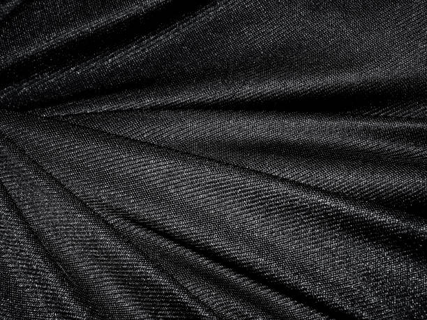istock Folds of black shine fabric 1223430614