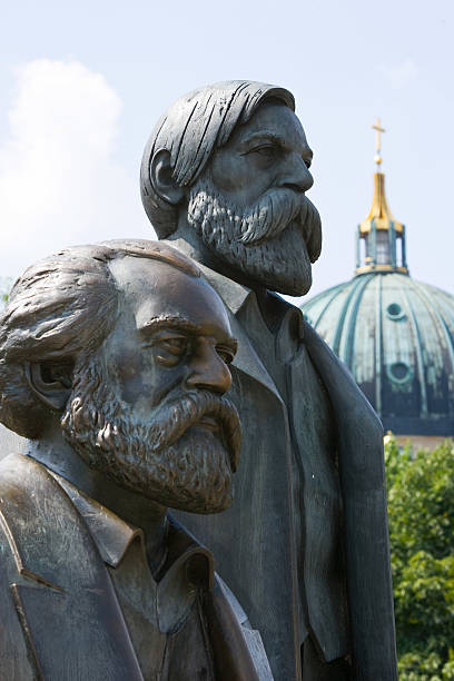 Statue of Karl Marx and Friedrich Engels, Berlin, Germany  friedrich engels stock pictures, royalty-free photos & images