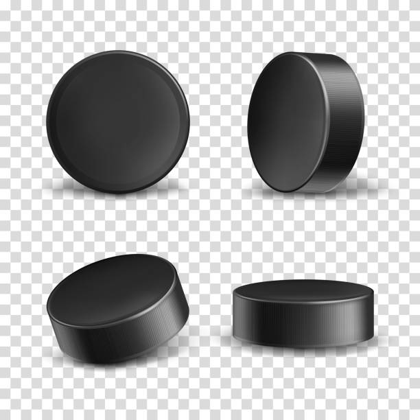 Black rubber pucks for ice hockey Vector set of 3d realistic black rubber pucks for play ice hockey isolated on transparent background. Hard round disk, sport equipment, inventory for winter team game on skating rink hockey stock illustrations