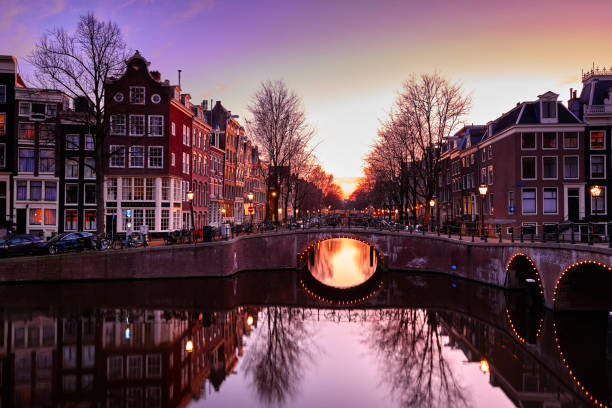 istock Amsterdam canals and typical canal houses at dusk 1223433785