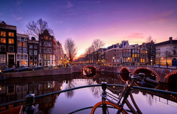 istock Amsterdam canals and typical canal houses at dusk 1223434025