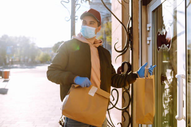 istock Delivery service in quarantine city. Covid-19 1223434557