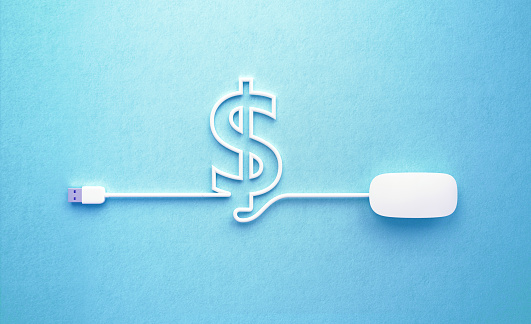 White mouse cable forming an American Dollar sign on blue background. Horizontal composition with copy space. Money transfer concept.