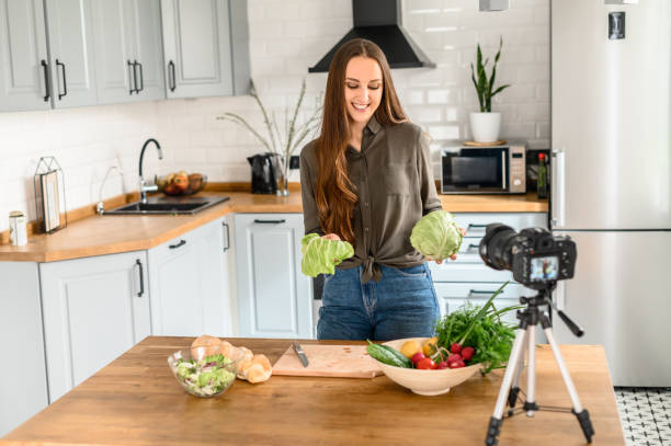 istock A young woman is recording video cooking lessons 1223442152