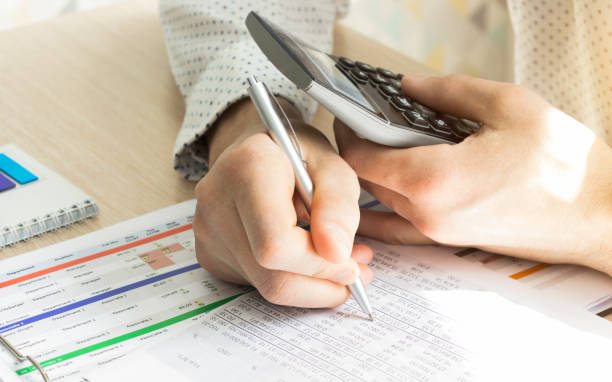 istock Financial trading chart double exposure with man desktop background. 1223444603