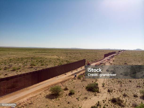 An Aerial View Of The International Border Wall With Portions Still Under Construction Stock Photo - Download Image Now