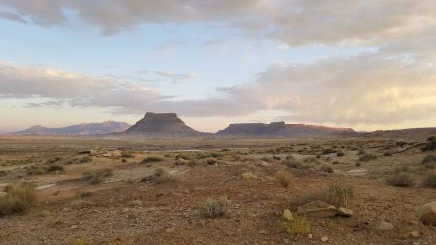 istock Sunset over Ancient Desert Landscapes 1223455186