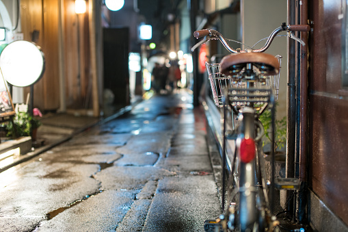 street in Kyoto at night on rainy day