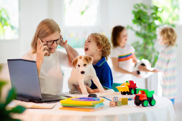 istock Mother working from home with kids. Quarantine. 1223455556
