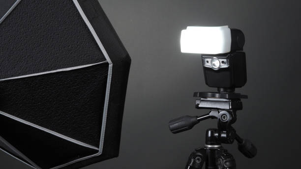istock Studio light and back drop and soft box set up for shooting photo or video production which includes flashlight and continue lighting on tripod and paper background and used for photographer or videographer 1223456530